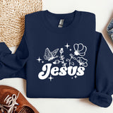 a blue sweatshirt with the word jesus printed on it