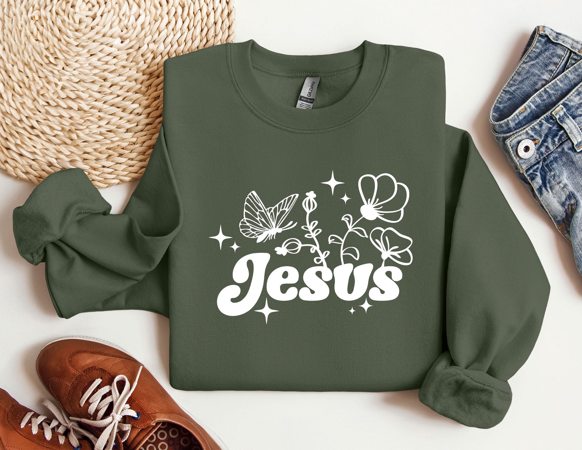 a sweatshirt with the word jesus printed on it