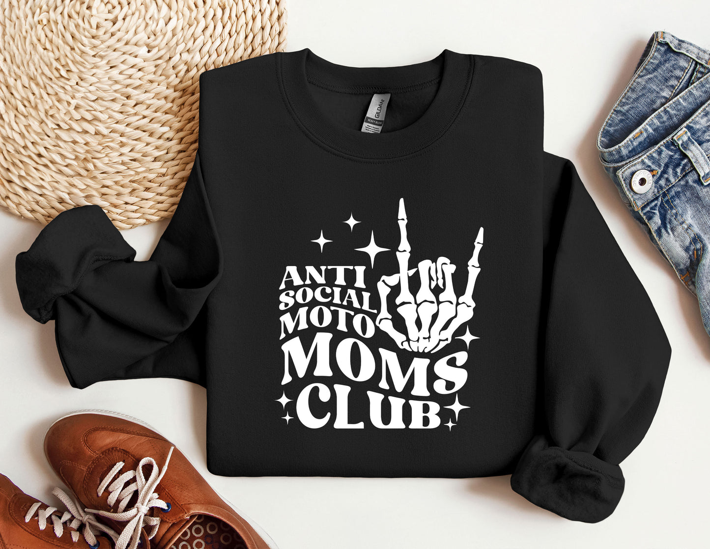 a black sweatshirt with a white print that says anti - social moms club