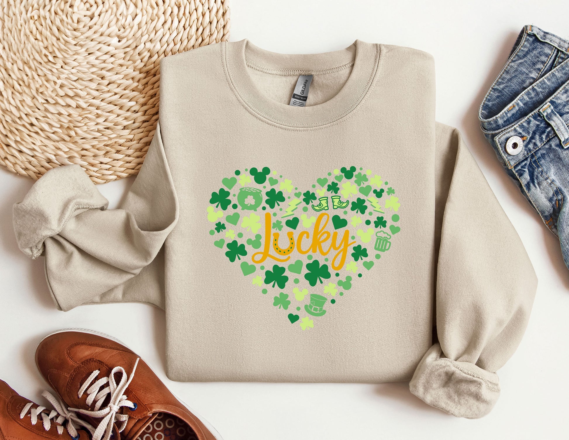 a sweater with the words lucky on it next to a pair of shoes