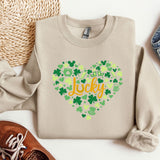 a sweater with the words lucky on it next to a pair of shoes