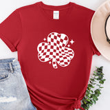 a red shirt with a four leaf clover on it