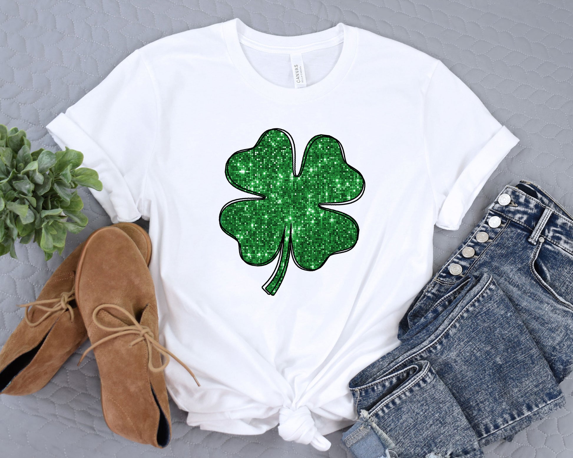 a t - shirt with a shamrock leaf on it