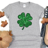 a st patrick's day t - shirt with a four leaf clover