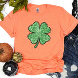 a t - shirt with a four leaf clover on it