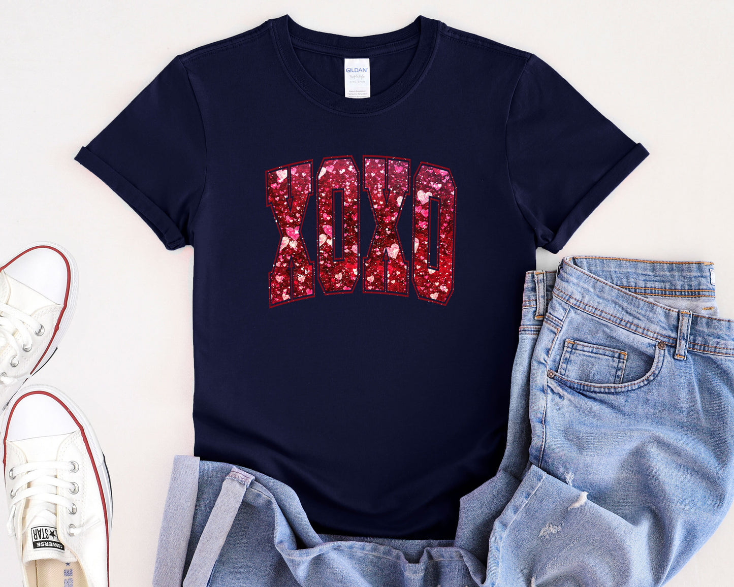 a t - shirt with the word dad written in sequins