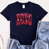 a t - shirt with the word dad written in sequins