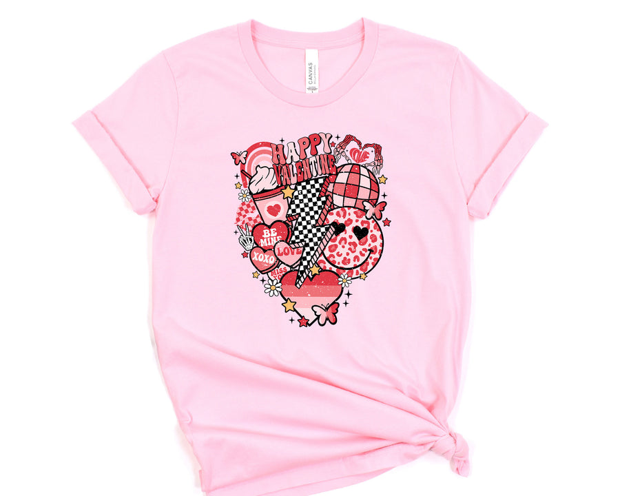 a pink t - shirt with a picture of a heart on it