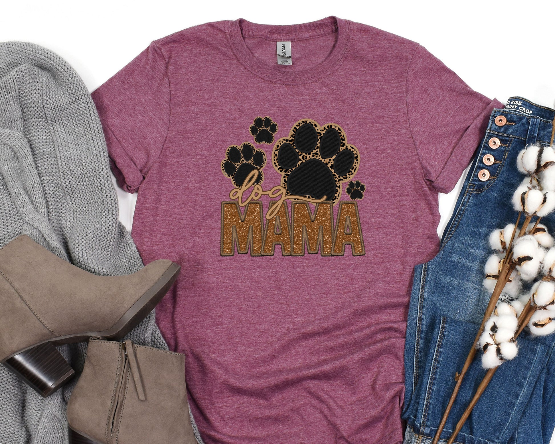 a shirt that says mama with a paw print on it