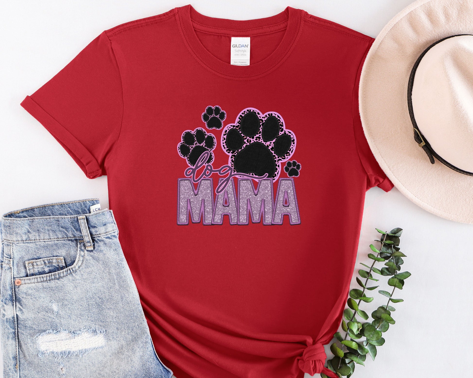 a red shirt that says mama with paw prints