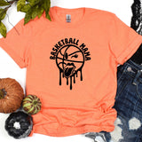 a t - shirt with a basketball logo on it