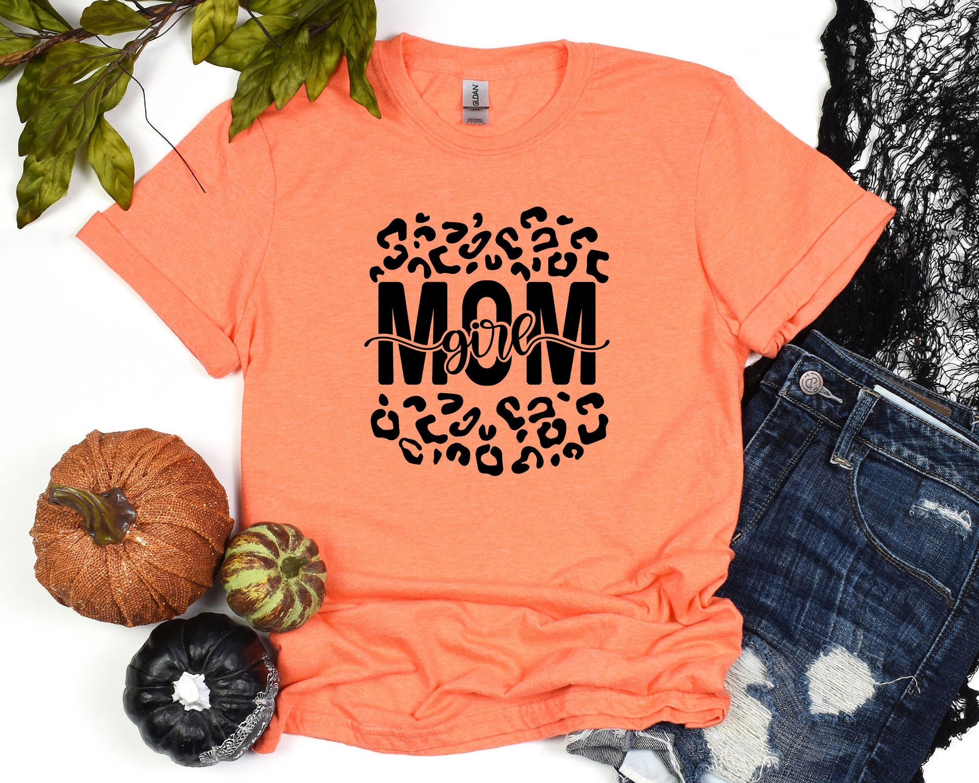 a t - shirt with the word mom printed on it