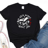 a black t - shirt with a bat on it