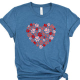 a blue t - shirt with hearts and paw prints