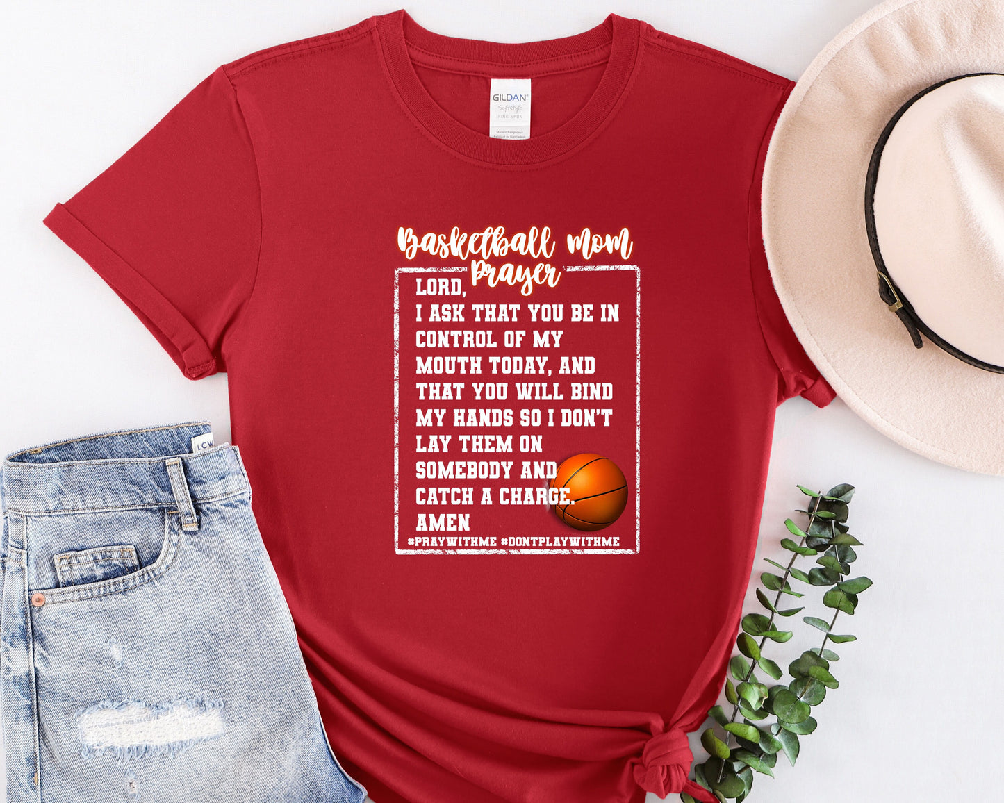 a red t - shirt with a basketball poem on it