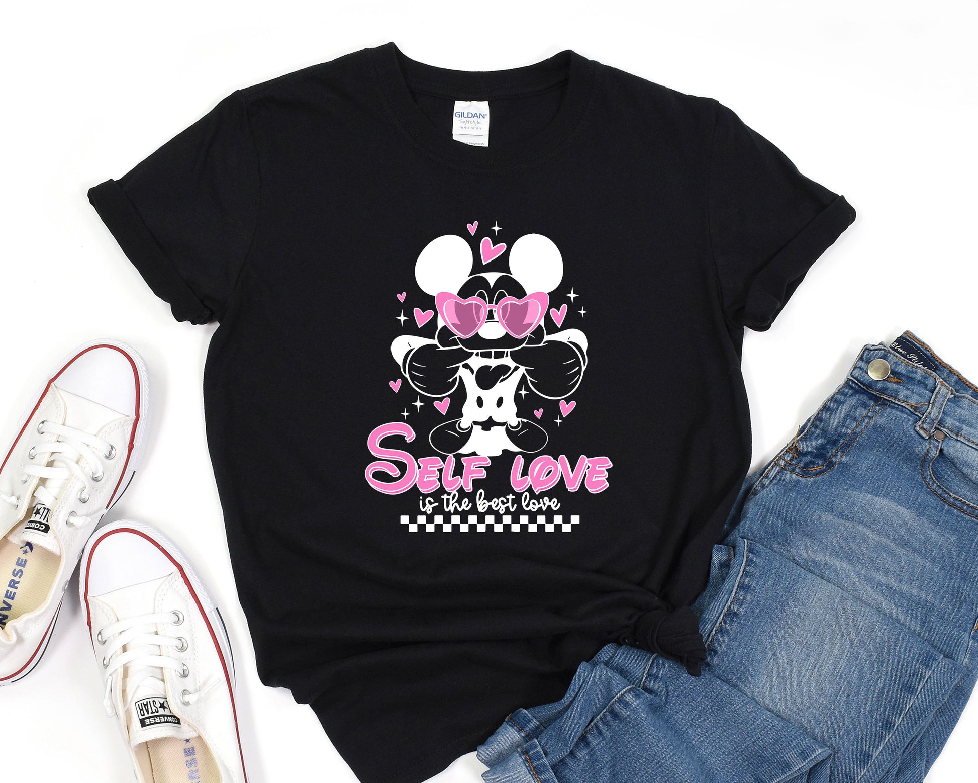 a black shirt with a minnie mouse on it