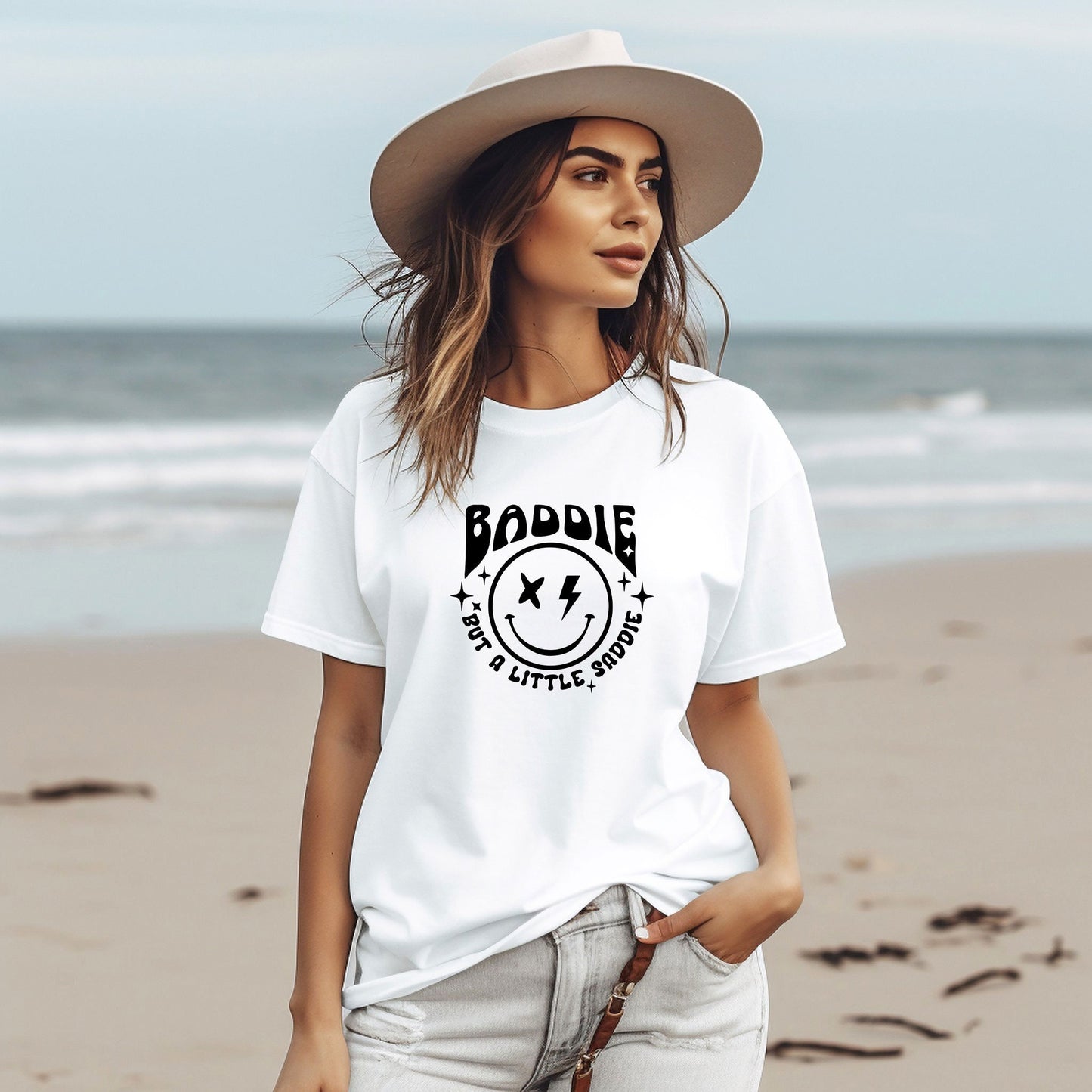 a woman wearing a white t - shirt and a cowboy hat