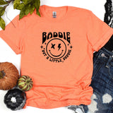 a t - shirt with a smiley face on it