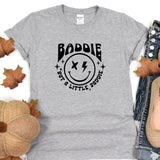 a t - shirt with a smiley face on it