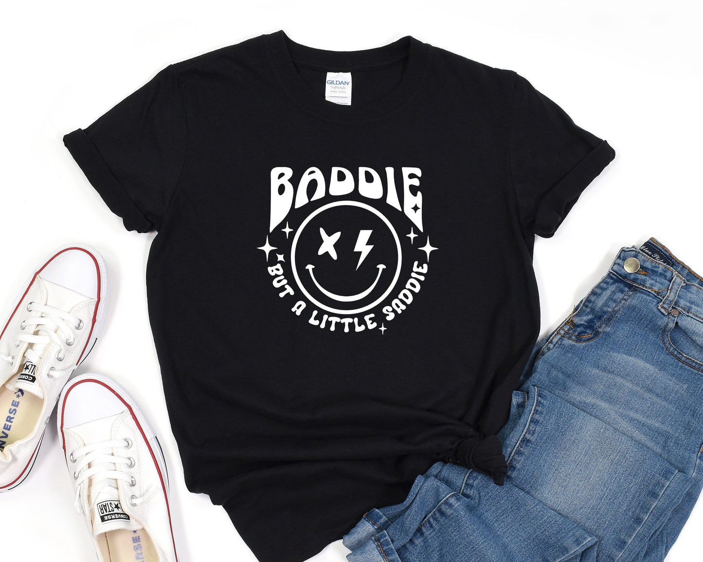 a black t - shirt with the words baddie on it