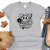 a t - shirt with a smiley face on it