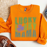 a pair of shoes and an orange shirt on a white surface