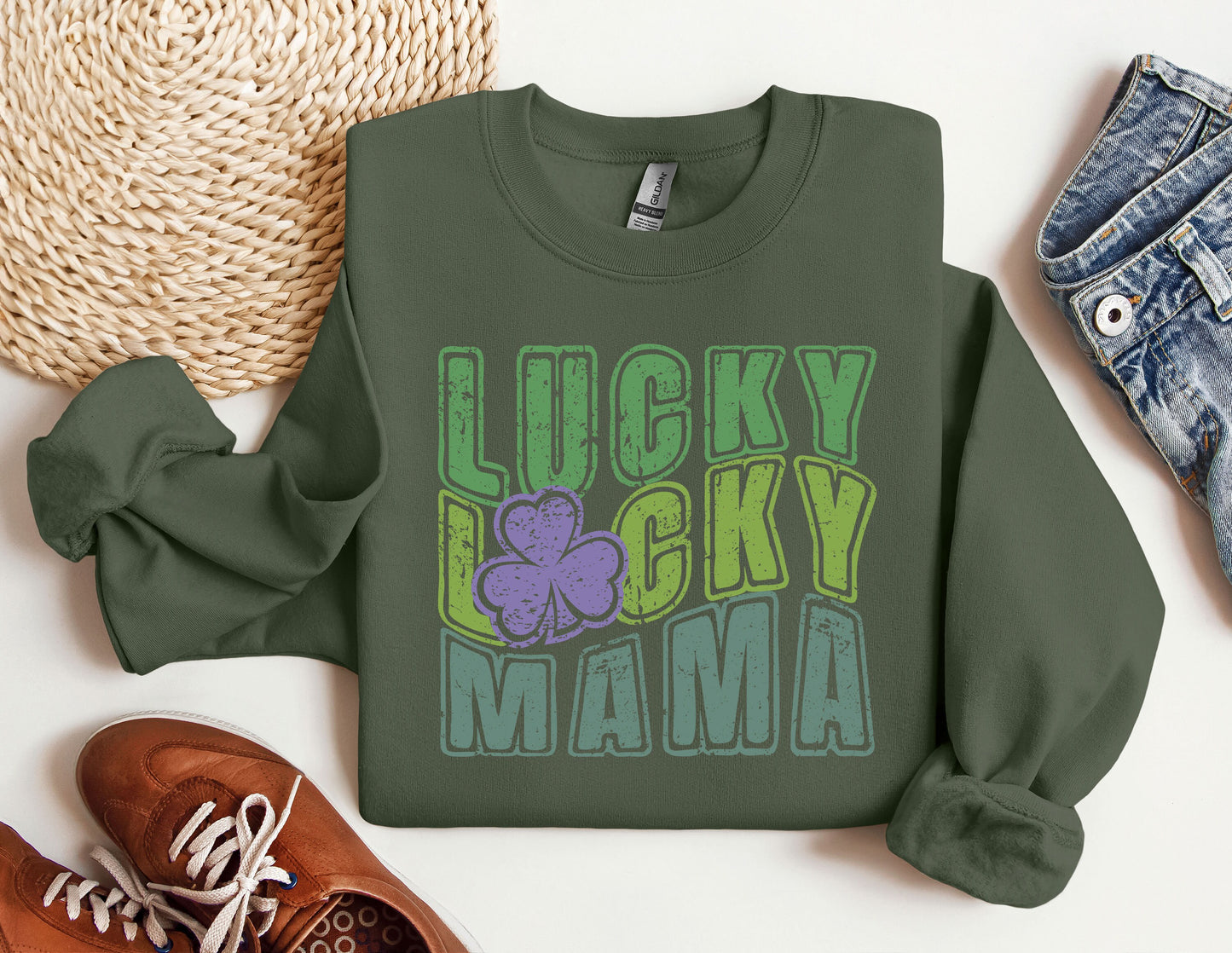 a green sweatshirt with lucky lucky mama on it