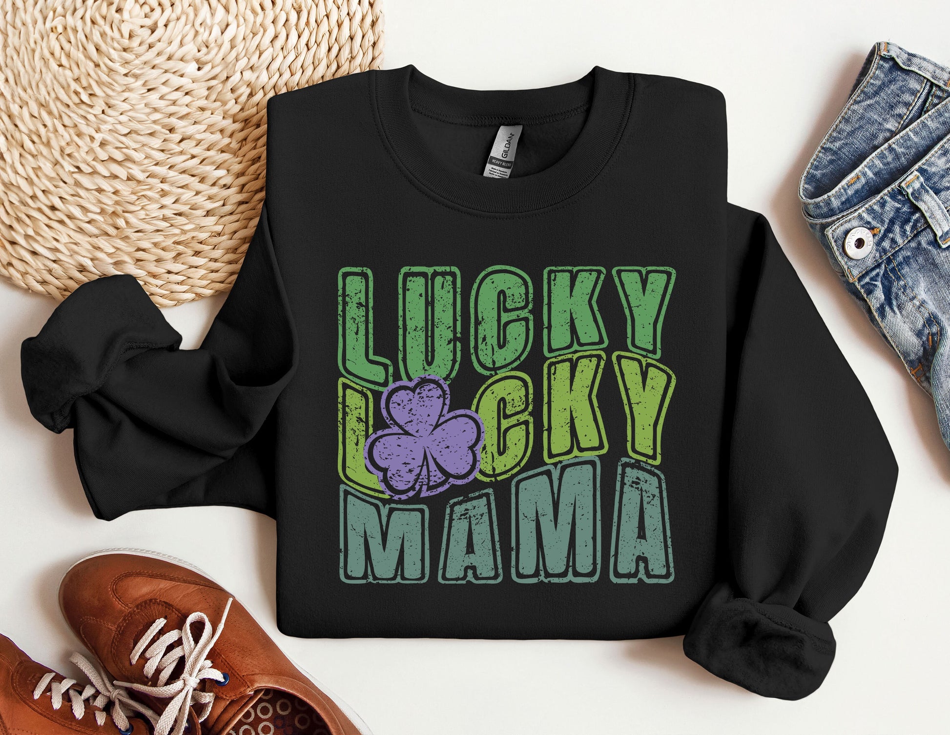 a lucky lucky mama sweatshirt next to a pair of sneakers