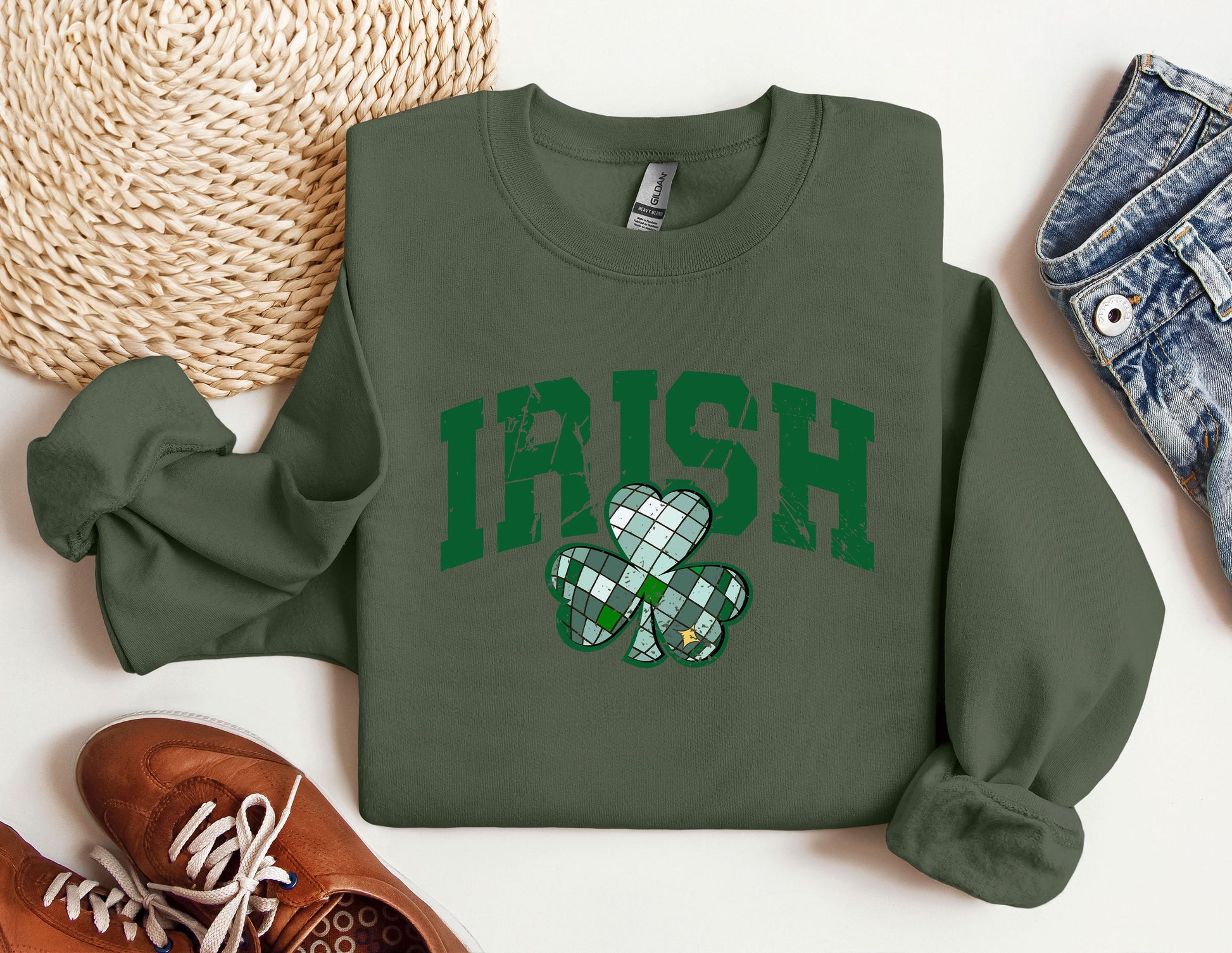 a green irish sweatshirt with a shamrock on it