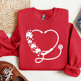 a red sweater with a stethoscope and flowers on it