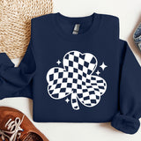 a blue sweater with a four leaf clover on it
