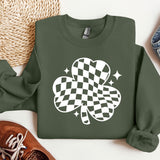 a green sweatshirt with a four leaf clover on it