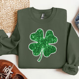 a green sweatshirt with a four leaf clover on it