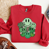 a red sweater with a green cactus on it