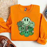 an orange shirt with a green cactus on it