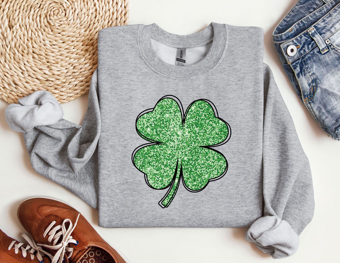 a st patrick&#39;s day sweatshirt with a shamrock on it