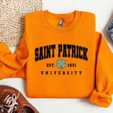 an orange sweatshirt with saint patrick on it next to a pair of shoes