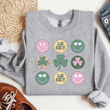 a st patrick's day sweatshirt with shamrocks and shamrocks on it