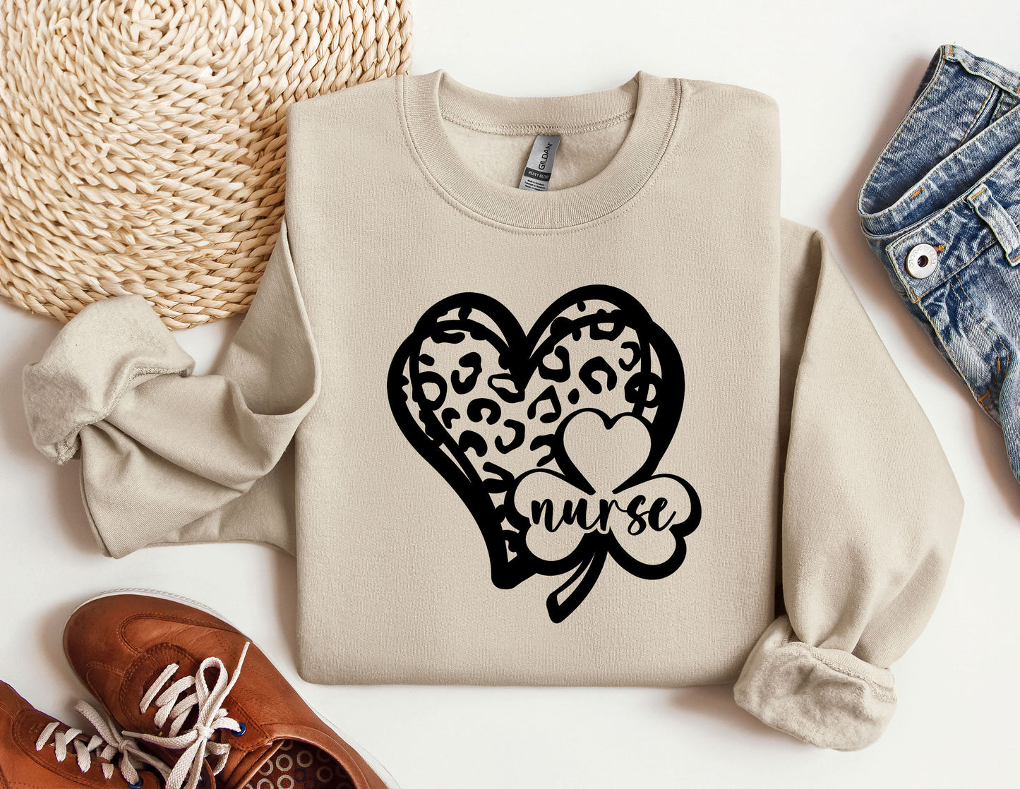 a sweater with a heart and two hearts on it