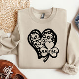 a sweater with a heart and two hearts on it