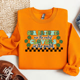 a pair of shoes and a sweatshirt on a table
