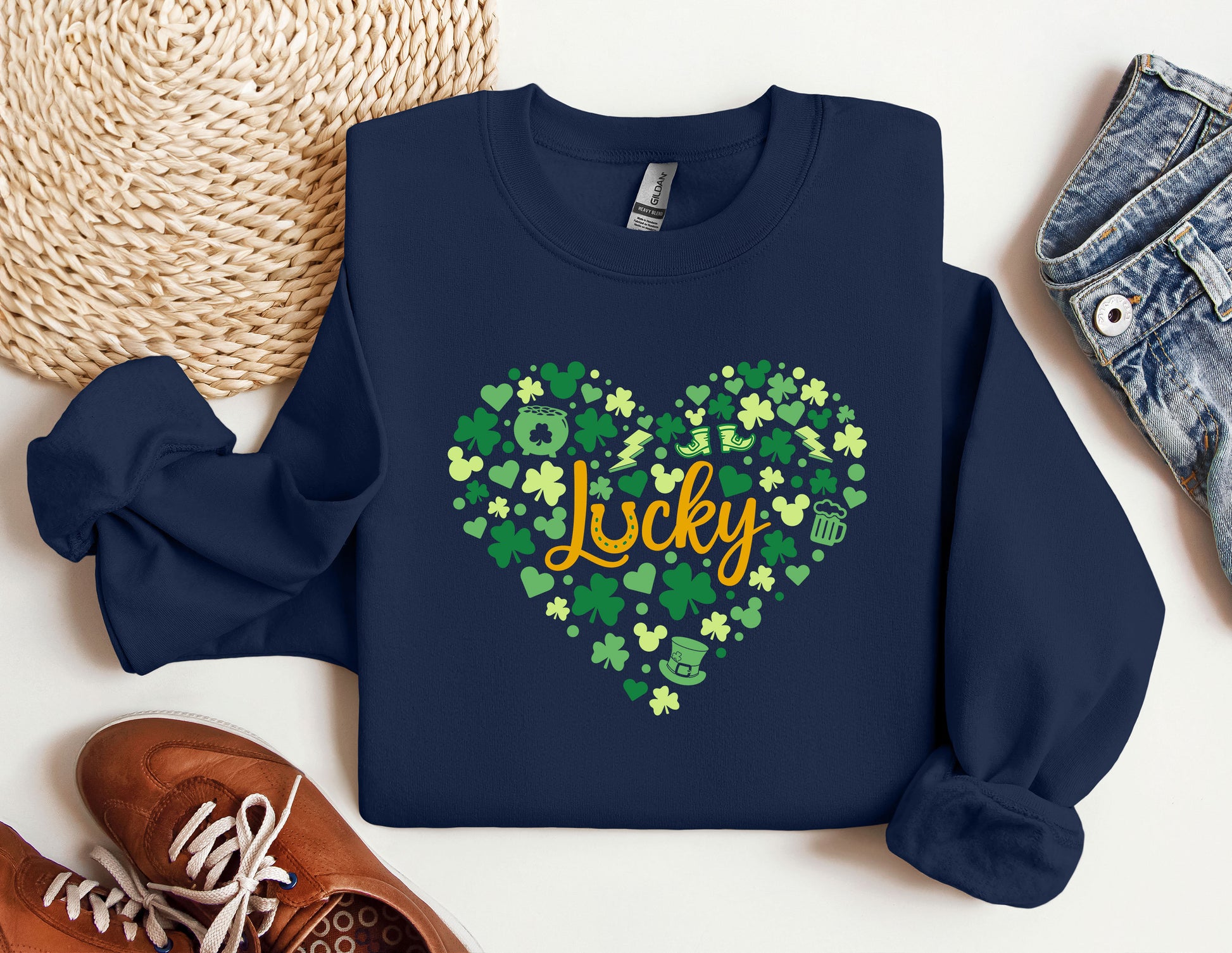 a blue sweatshirt with a shamrock heart and the word lucky on it