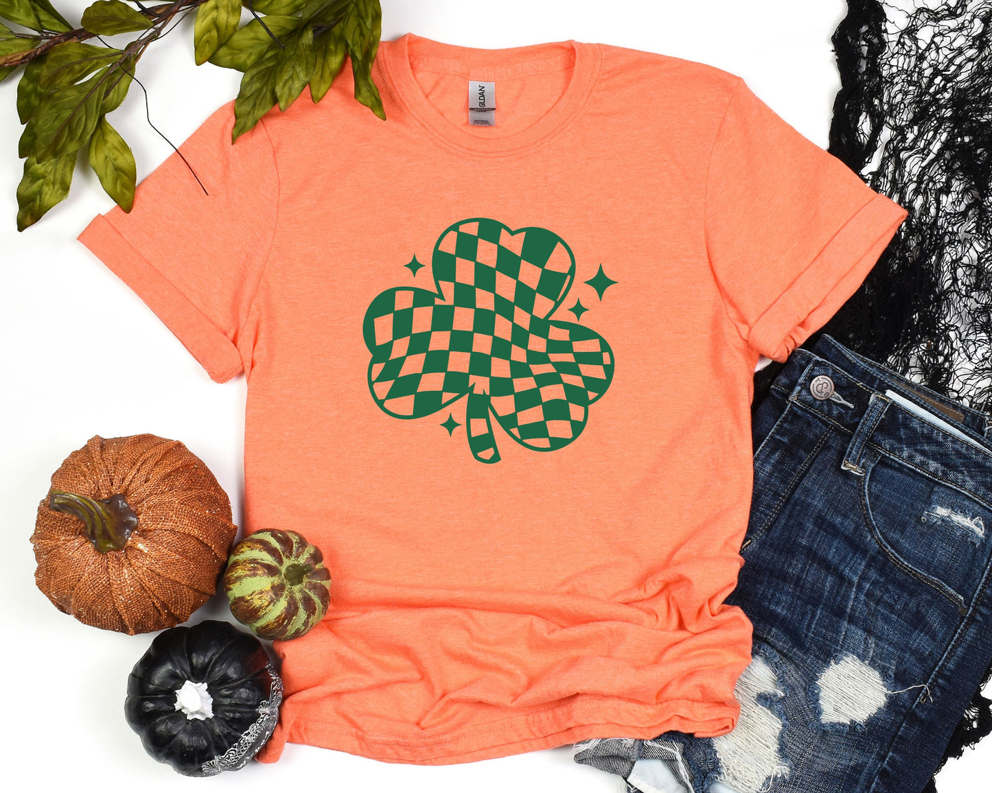 a t - shirt with a four leaf clover on it