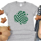 a st patrick's day t - shirt with a four leaf clover