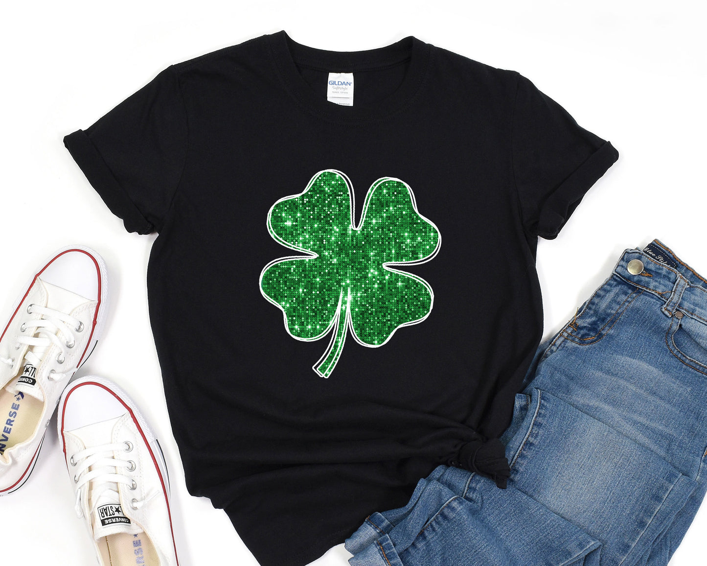 a t - shirt with a four leaf clover on it