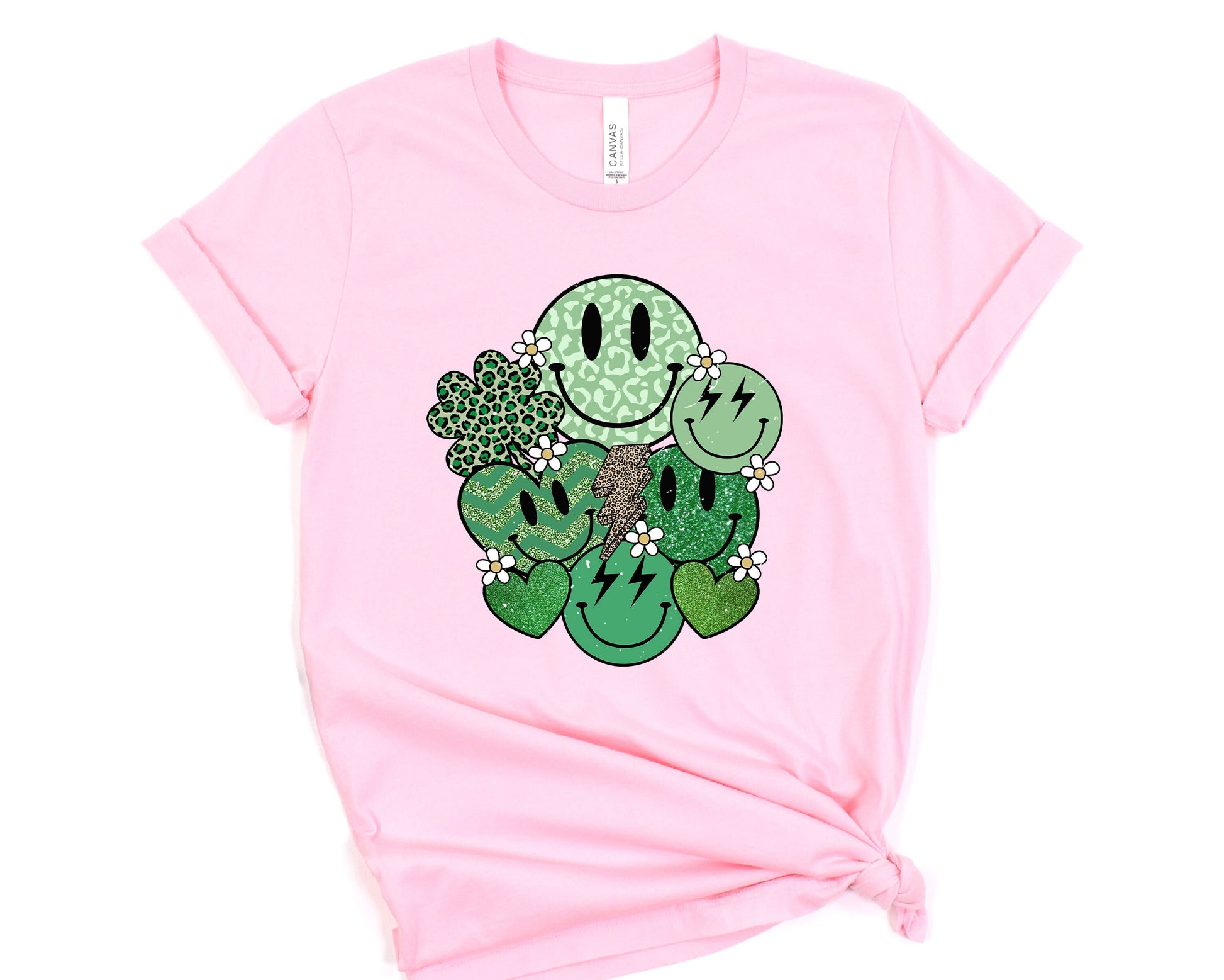 a pink t - shirt with a green cactus design on it